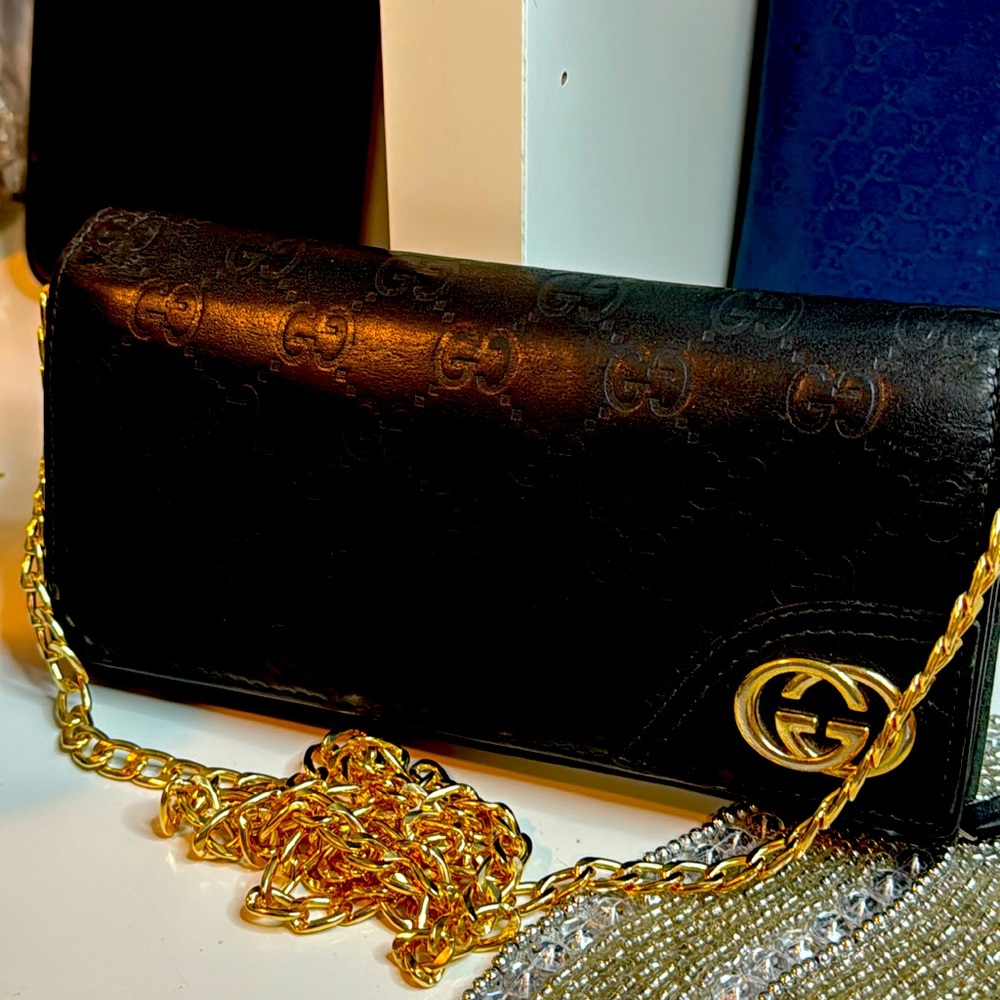 Gucci GG logo long black GG bifold zippy wallet